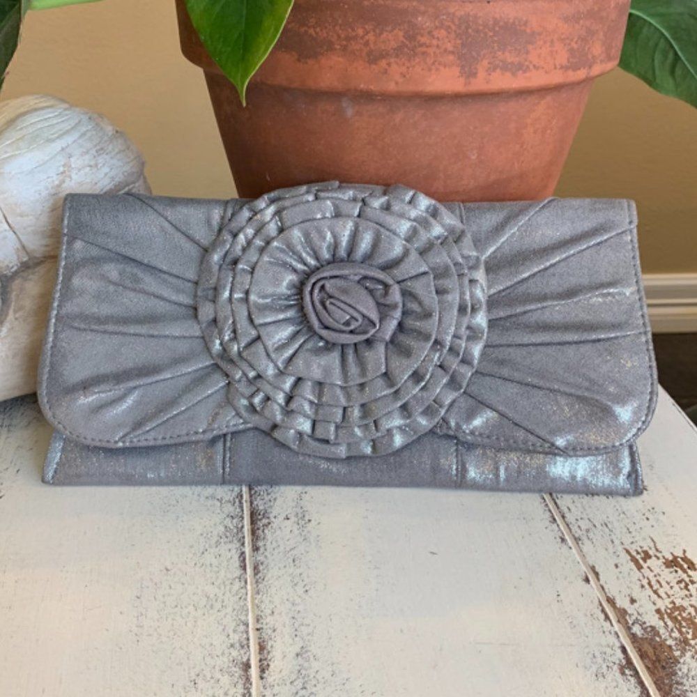 Silver with flower accent clutch purse